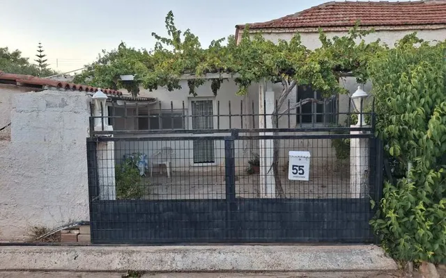 Отдельный дом в National Bank of Greece